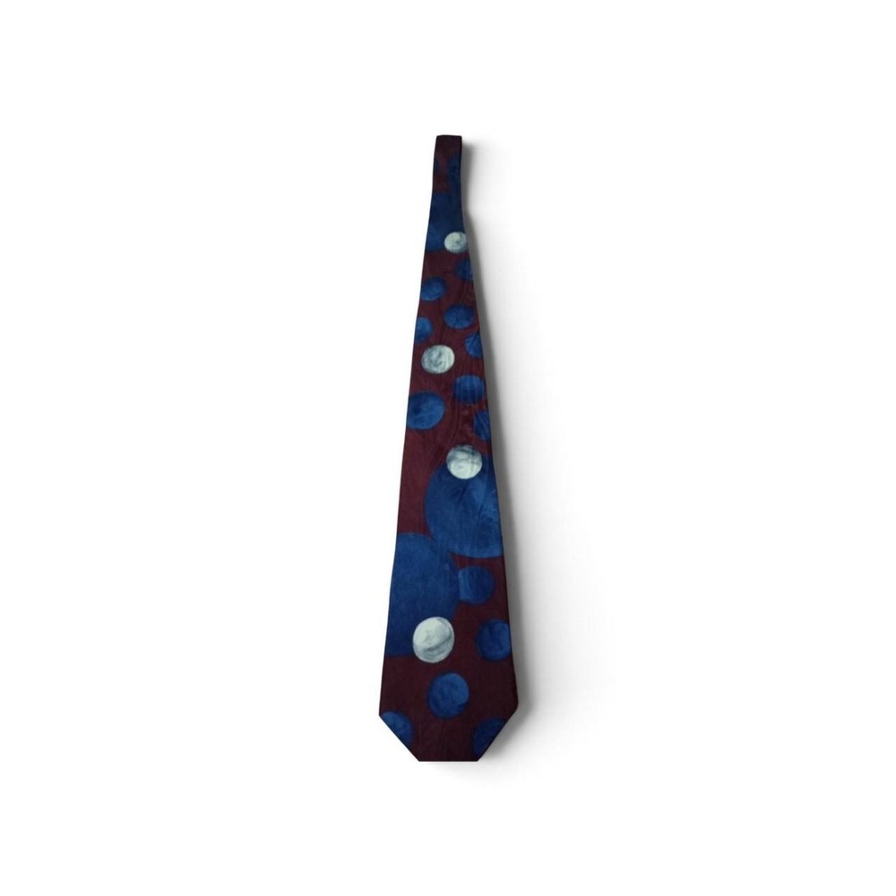 Halston silk tie with blue circles and moons on a maroon background